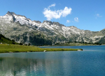 Rent a holiday home in the Hautes-Pyrenees. This picture shows Lac Bleu - a natural lake formed in the mountains at over 1000m above ground level. Totally isolated, the only route there is on foot from Chiroulet. Allow a whole day - It's a 3 hour climb/descent each way!