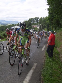 The Tour de France peleton coming over the top of the Col de Loucroup in 2008